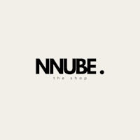 a black and white logo for nnube the shop